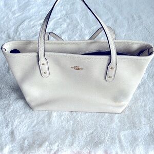 Ivory coach purse